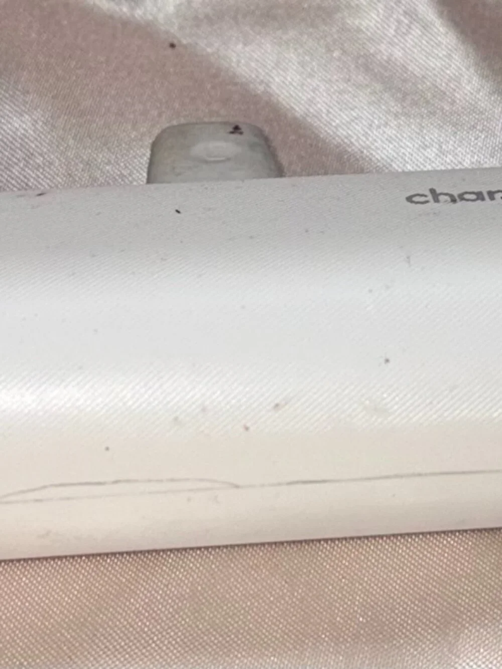 white portable charger